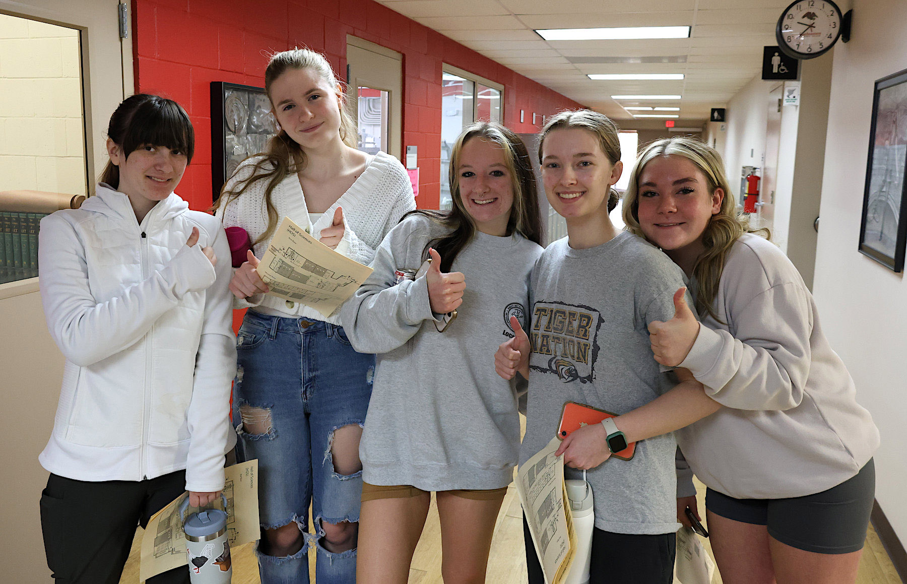 Smiling students in hallway