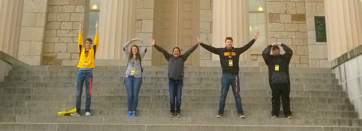 TRIO students spelling out IOWA with their arms and bodies