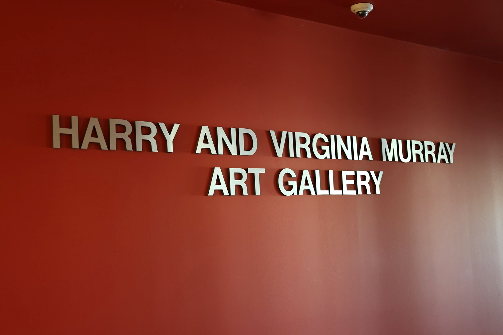 Red wall with Murray Art Gallery signage