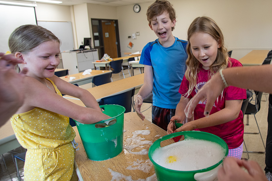 Kidtek students conduct a slippery science experiment