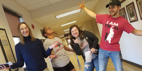 Students posing in hallway