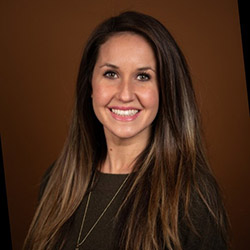 Kelsey Howard Smiling female with long brown hair
