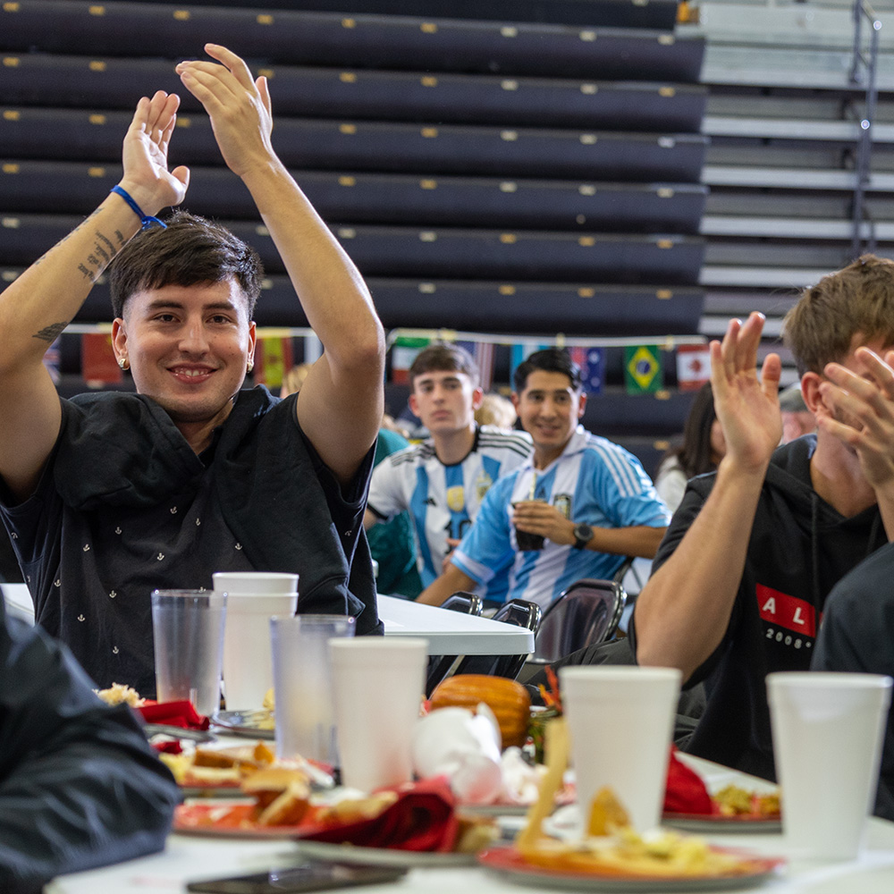 international student enjoying the SCC Multicultural Thanksgiving dinner