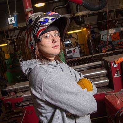 Female welding student