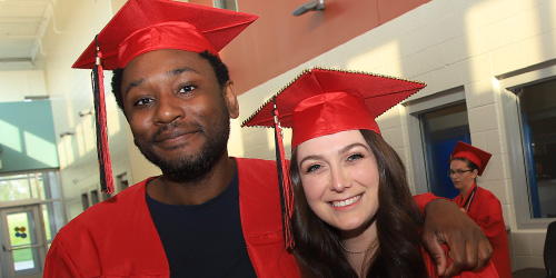 guy and gal graduates